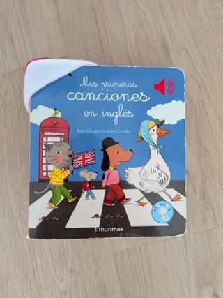 El libro Mis primeras canciones en inglés, de Timunmas, con el gato, el perro y la oca cruzando un paso de cebra