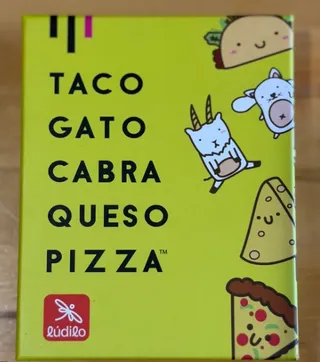 La caja verde de Taco Gato Cabra Queso Pizza, de Lúdilo, con los dibujos del taco, la cabra y la pizza